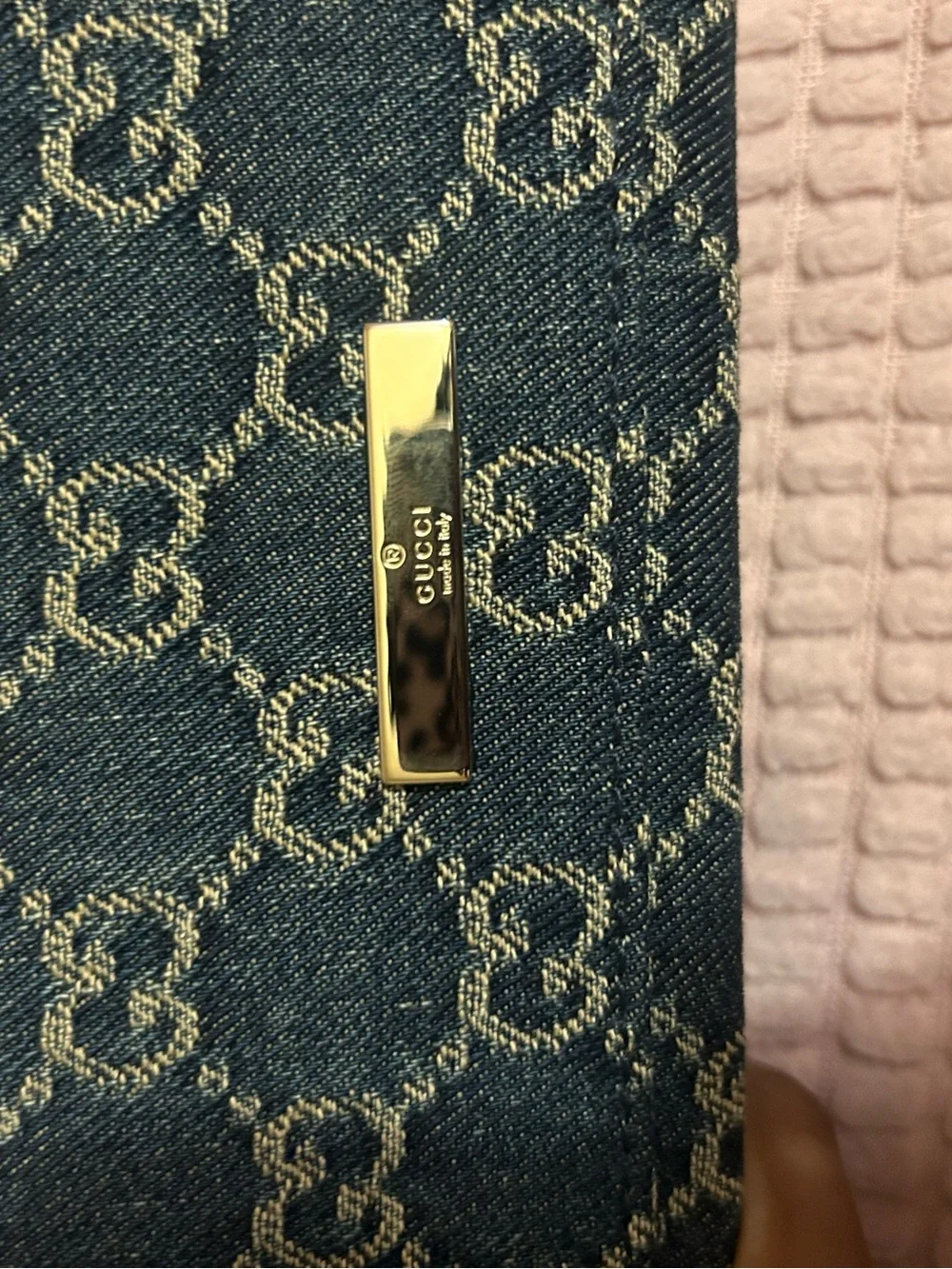 Small pouch with strap and Gucci plaque